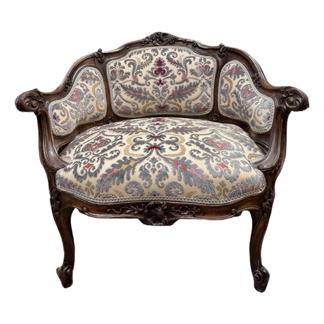 Early 20th Century Petite Needlepoint Bergère Chair With Intricately Carved Walnut Frame For Sale