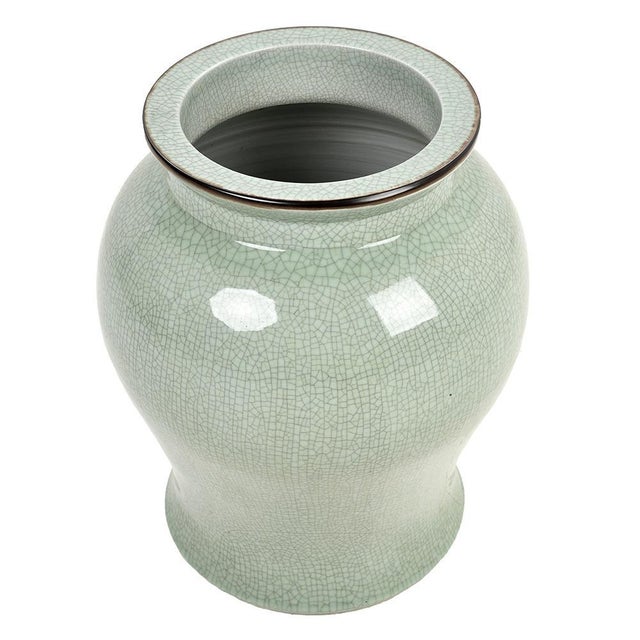 This Celadon vase is an exceptional piece, ideal for lovers of refined oriental ceramics. Measuring 56 cm in height and 48...