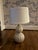 Delphine Lamp features a modern style fluted gourd cast composite base. The natural concrete finish gives a masculine...