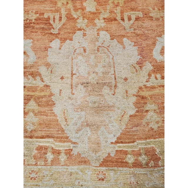Textile Antique Oushak Carpet, Handmade Oriental Rug, Coral Field, Gold, Ivory Border For Sale - Image 7 of 11