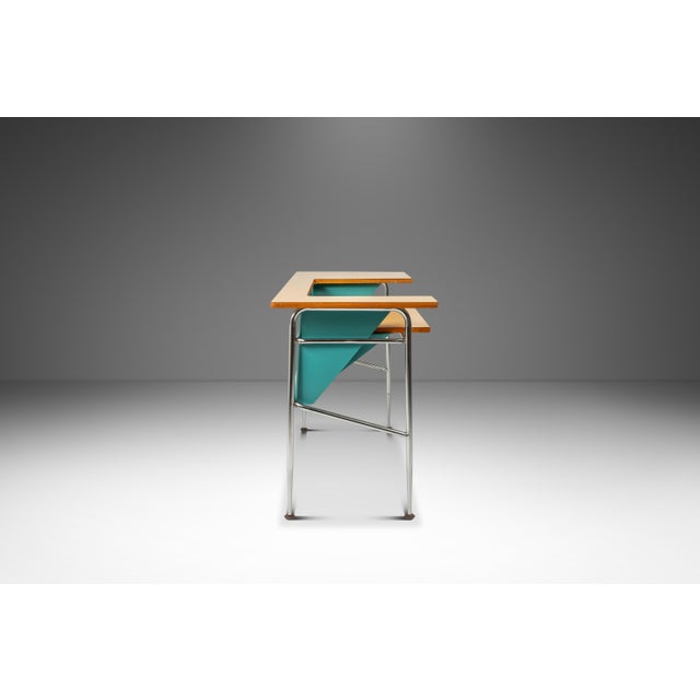 Simultaneously minimal and stylish this charming writers desk, produced in the late 60s or early 70s, is the very epitome...