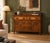 An Edwardian Art Nouveau walnut sideboard, dating from circa 1900–1910. Featuring figured drawer fronts, flowing floral...