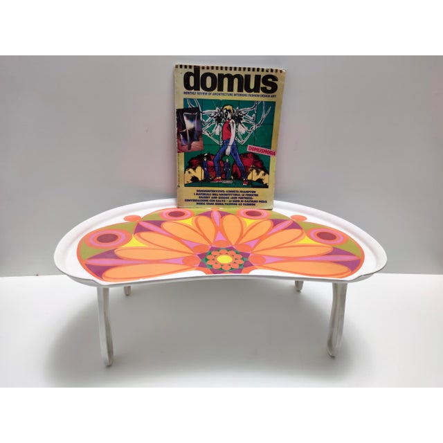 Made in Italy in 1970s. This tray is made in plastic and is decorated with a typical 70s motif and colors. It is a vintage...