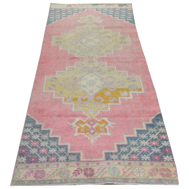 Hand-knotted with care using traditional rug-making techniques, this wool rug blends timeless craftsmanship with a modern...