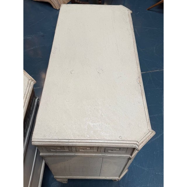 The Pair of Painted Swedish Chests with Greek Key Design adds a touch of elegance to any room. The painted finish has a...