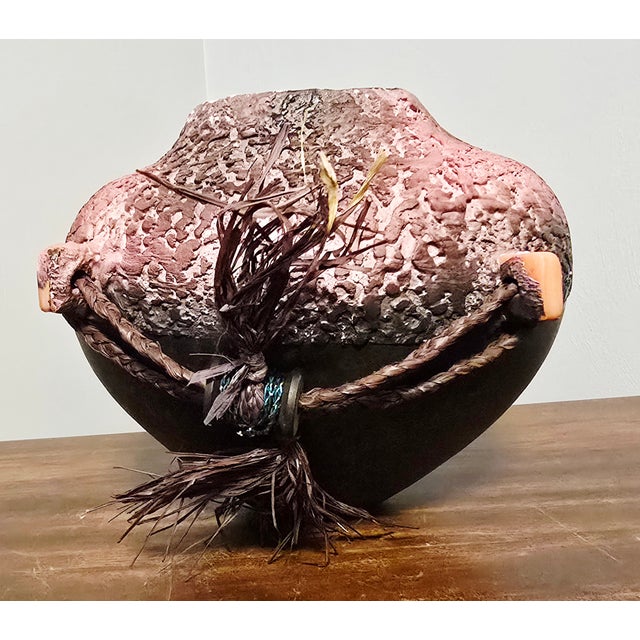 A striking signed sculptural vessel by contemporary ceramic artist Steven Kaye, blending raw texture, refined form, and...