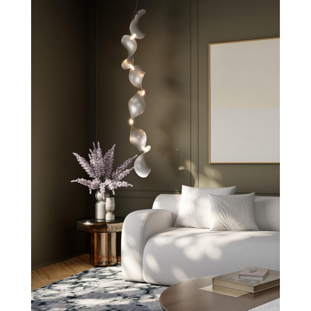 The wide, undulating curves of large sand dunes inspired us to create the modular Dune light fixture. Fascinated by the...