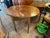 This product is a pair of antique American small drop-leaf side or end tables, made of mahogany with a brown finish. The...