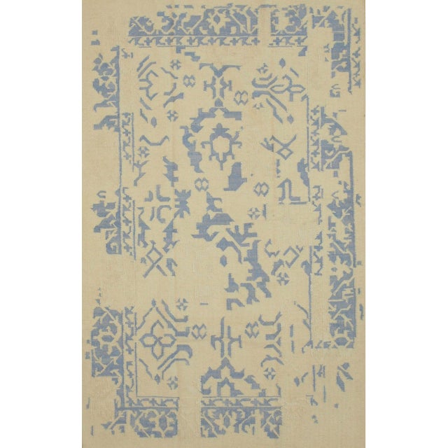 Stylish Graceful Blue Flatweave Wool Rug, Country of Origin: India. This striking piece represents a contemporary...