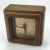 Vintage Walnut Wood is carefully carved and sanded smooth like silk to make this working battery powered table clock....