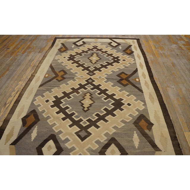 1930s Navajo regional rug ( 5' x 7' 8'' - 152 x 233 cm ) Antique 1930s Wool Rectangle Flat Weave Gray Rug, Circa Date:...