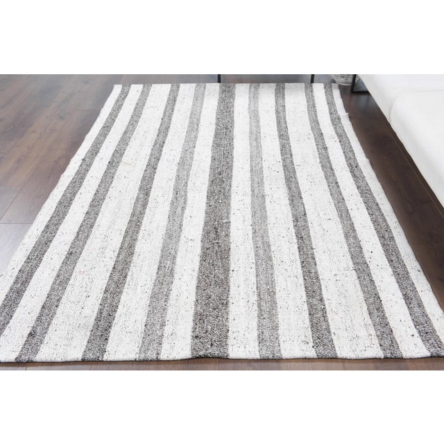 Vintage Turkish Hand-Knotted vintage rug is a semi-antique vintage kilim area rug.'70s Eastern region of Turkey's unique...