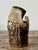 This remarkable studio pottery vase is a masterclass in Brutalist texture and organic form, epitomizing the raw,...