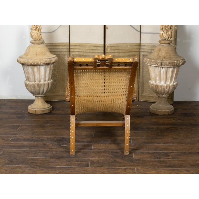 Brown Early 20th Century Anglo-Indian Inlaid Plantation Chair with Scrolling Foliage and Extending Arms For Sale - Image 8 of 12