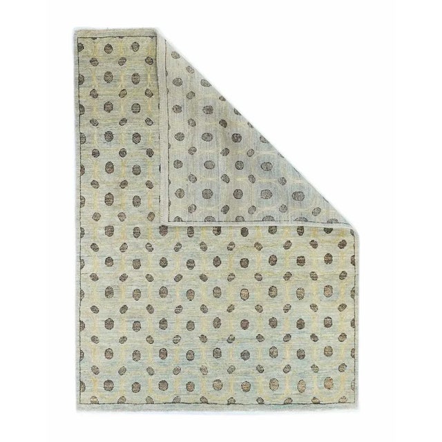 This recent, high-pile, essentially borderless Gabbeh scatter shows a composite wool/silk/cotton pile in tweedy-textured...