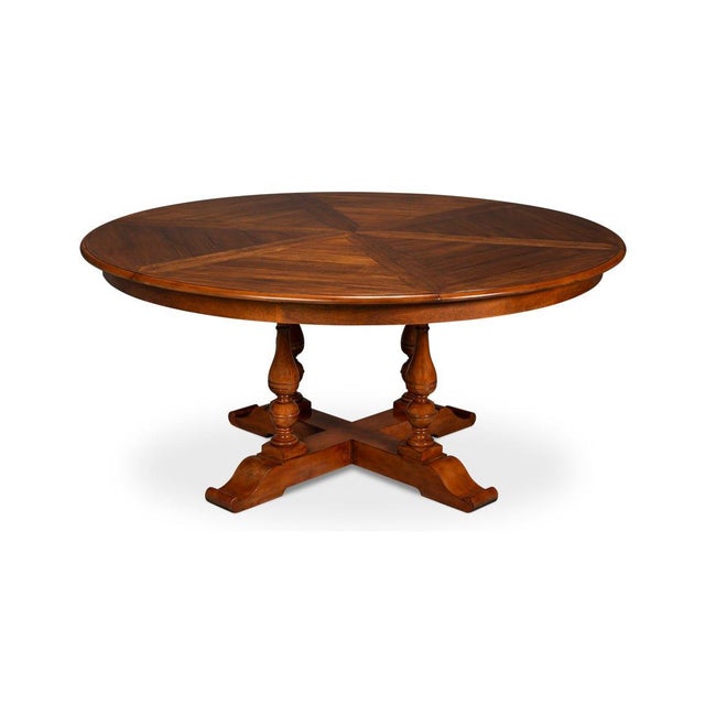 Four turned baluster uprights support a farmhouse-patterned walnut top in an Old World walnut finish, meeting a...