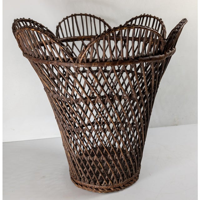 We are selling this pretty reticulated basket. We believe this basket to be 20th century from the Northeast area. The...