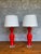 Striking pair of Italian Murano glass table lamps from the 1960s, featuring elegant pawn-form bodies in a vibrant...