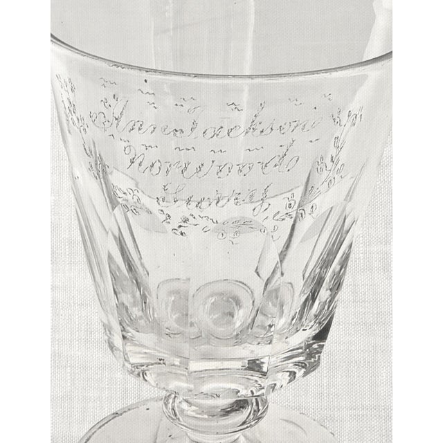 An exceptional Georgian rummer glass dating to the mid-to-late 18th century, featuring a classic bell-shaped bowl raised...