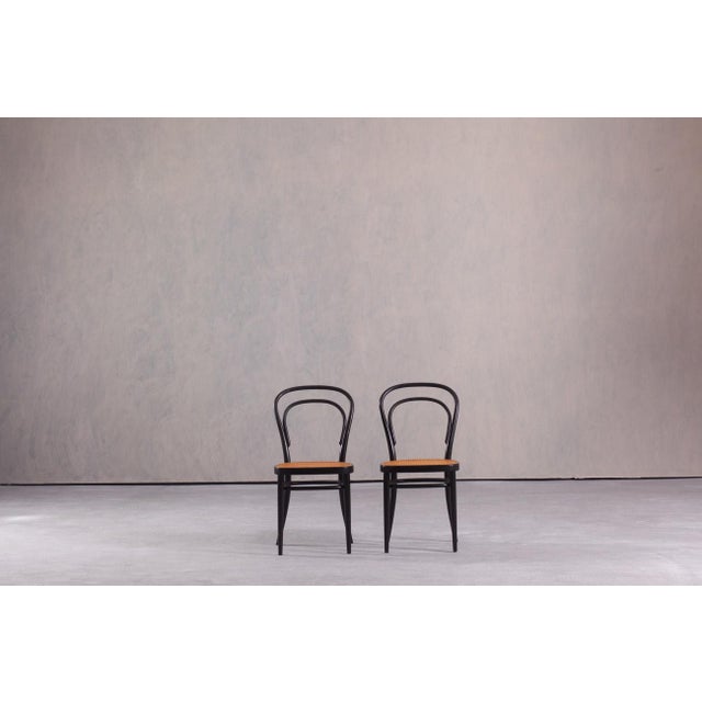 This set of two Thonet No. 214 chairs was produced in Austria during the 1970s. The original design was created by Michael...