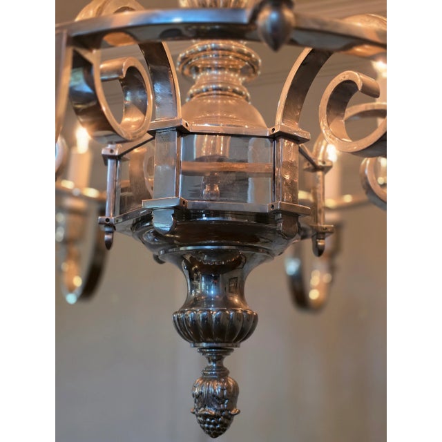 Exceptional vintage 12 light chandelier silver dipped for a beautiful soft radiant finish. 39" diameter, 32" h + 36" chain.