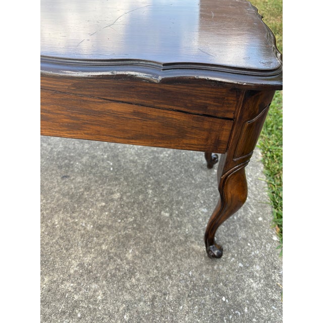 French Style Window Bench with Cabriole Queen Anne Legs . I believe the wood to be a Dark Stained Oak.