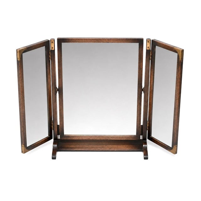 A smart and extremely well made antique military campaign style vanity mirror. This was made in England, it dates from...