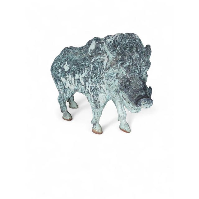 An extraordinary Spanish bronze sculpture from the 1950s, depicting a powerful wild boar in a bold and lifelike stance....