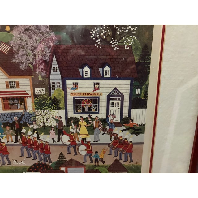 Large colorful Wooster Scott Lithograph named "Independence Day Parade". The piece is signed in pencil by renowned...