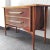 Scandinavian hanging chest of drawers with conical legs in teak wood and mahogany palm