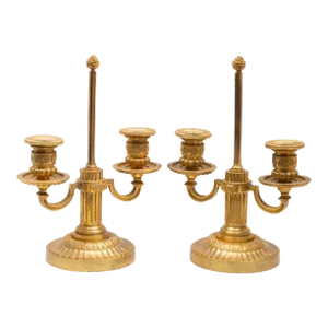 A Pair of Louis XVI Style Two-Light Ormolu Candlesticks