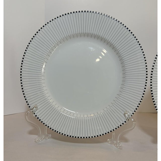 Museum-worthy and architect-designed, this rare Swid Powell Rays pair by Charles Gwathmey and Robert Siegel radiates...