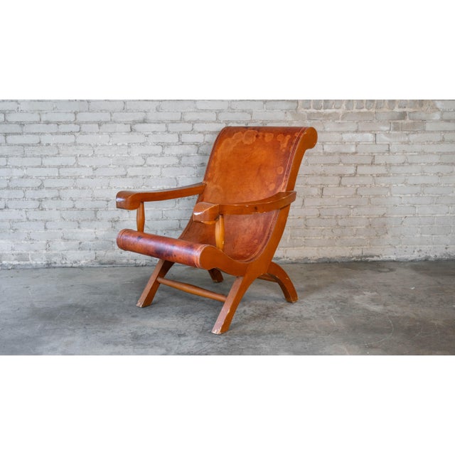 Crafted in Mexico 'Butaque' lounge chair designed by Dupuis in the manner of Clara Porset, circa 1990s. Modernist form...