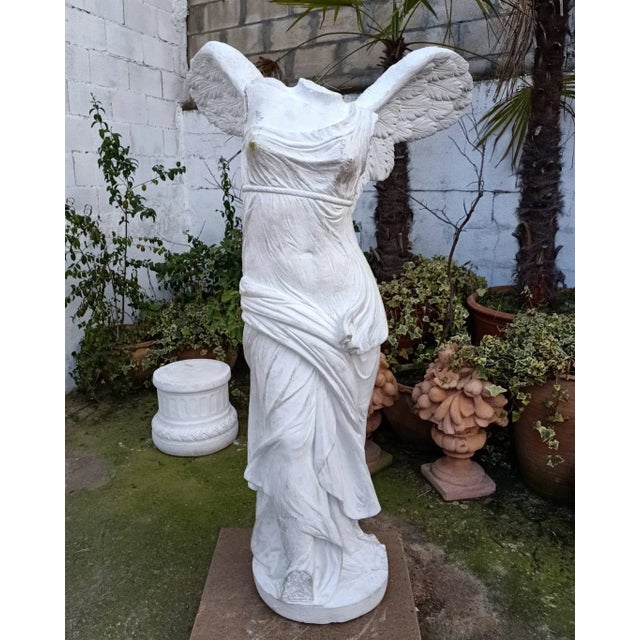 We present to you an imposing garden sculpture representing Nike, the Greek goddess of victory, better known as the Winged...