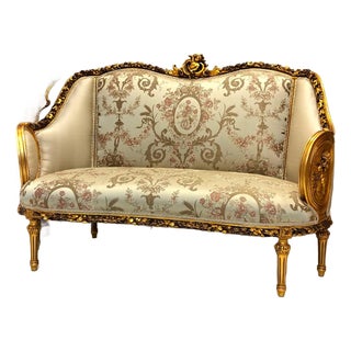 French Louis XVI Style Sofa – Gold Leaf Carved Frame With Elegant Floral Upholstery For Sale