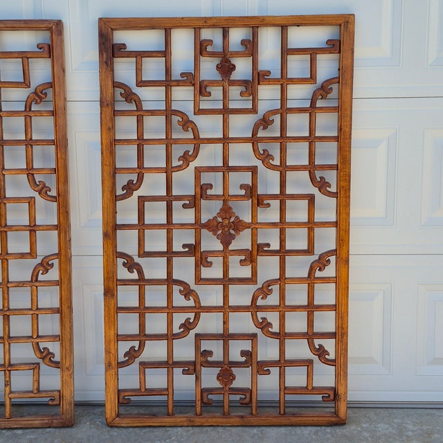 This is a remarkable pair of large Chinese lattice window screens or panels from the early 20th century or earlier. Each...