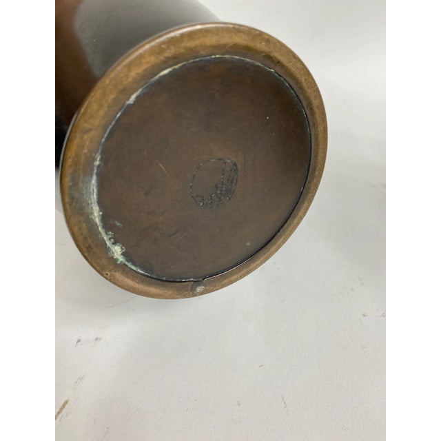 Vintage Chinese bronze vase with etching/ carving. Signed on the bottom