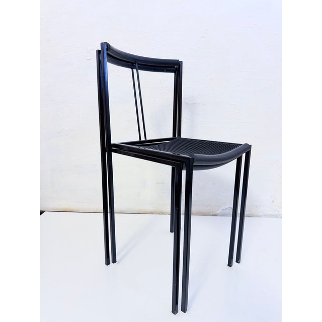 Two side chairs from the 1980s, designed in 1984 by Mauricio Peregalli for Zeus. Frame made of lacquered metal, seat and...