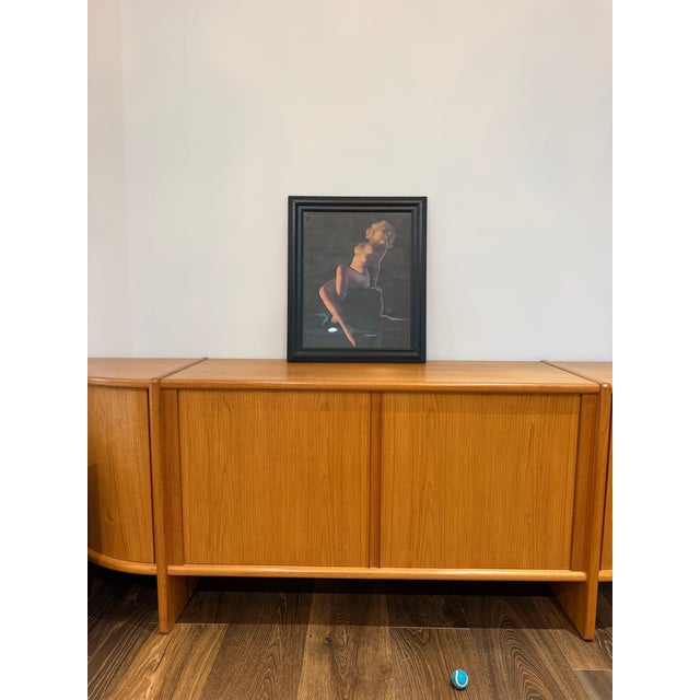 An elegant vintage framed reproduction of Earl Moran's celebrated pin-up illustration "A Modern Eve," capturing the...