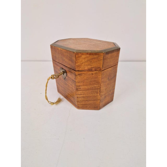 Antique octagonal wood/brass tea caddy (inc original key) a beautiful antique tea caddy, crafted in an elegant octagonal...