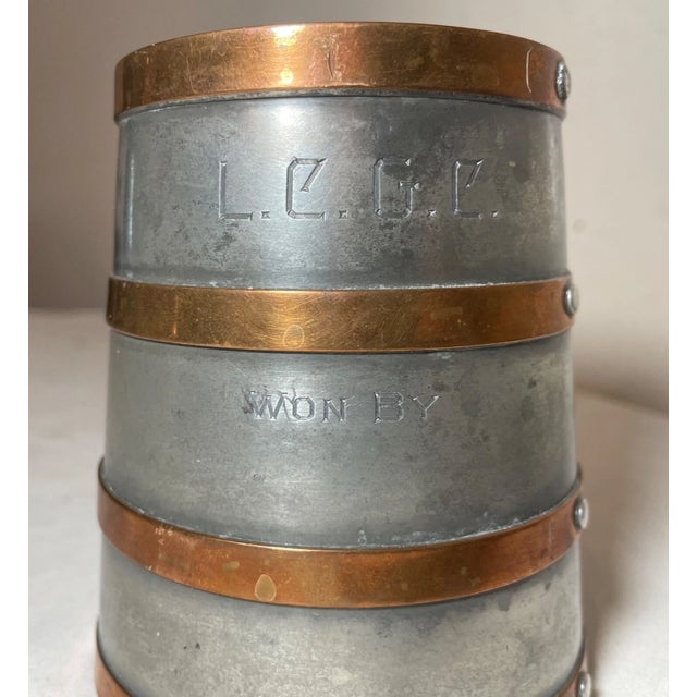 Up for sale we have a rare antique 19th century Arts & Crafts pewter and copper stein award. It is made by Reed and Barton...