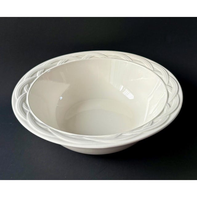 This vintage Pfaltzgraff serving bowl in the Acadia White pattern is a timeless addition to your kitchen or dining table....
