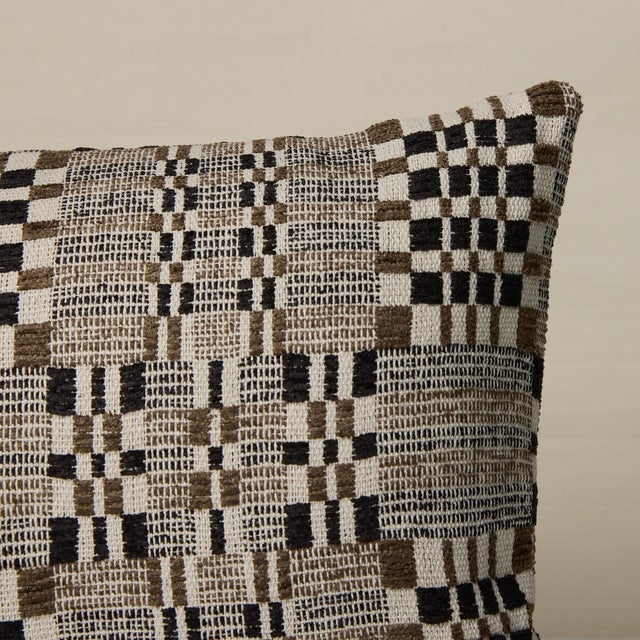 This pillow features Brimfield with a knife edge finish. Inspired by a vintage textile we found at the famed Brimfield...