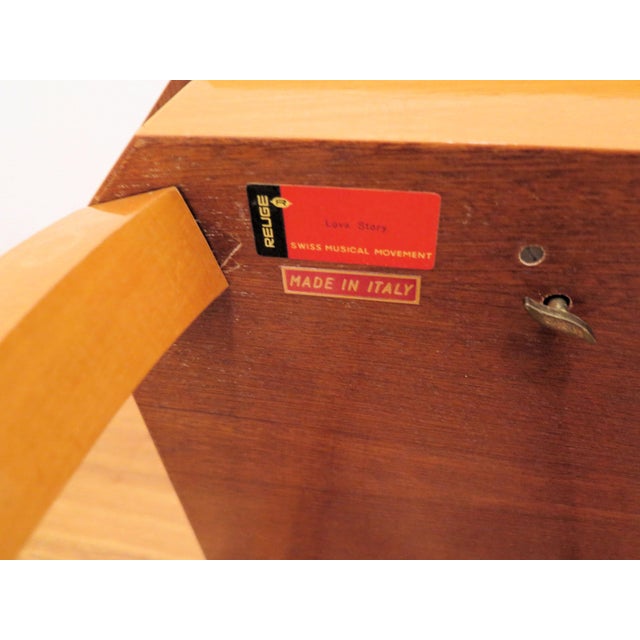 These nesting tables have the precious wooden inlaid design in all three tables. I can honestly use the words pristine in...