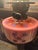 Victorian brass oil lamp converted into an electric lamp with finial and silk shade (most likely original). Pink painted...