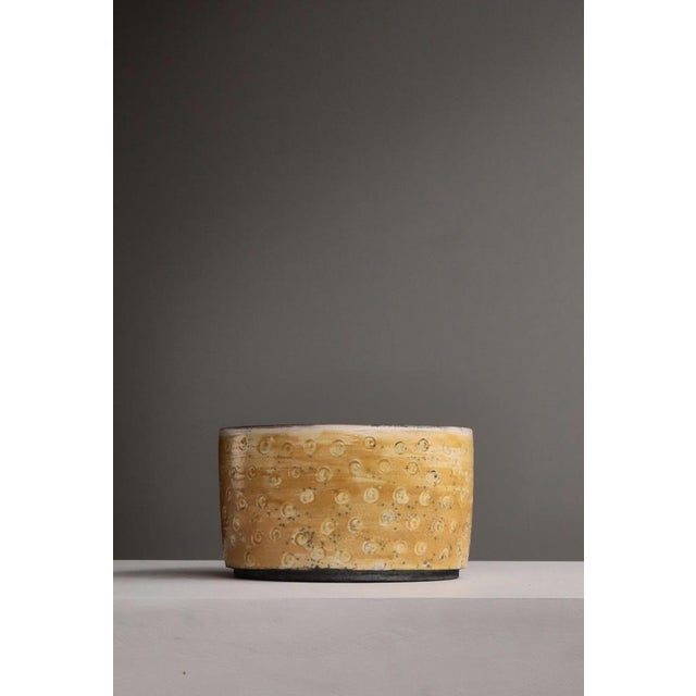 A striking example of Danish studio ceramics, this large handcrafted stoneware bowl by acclaimed ceramic artist Inger...