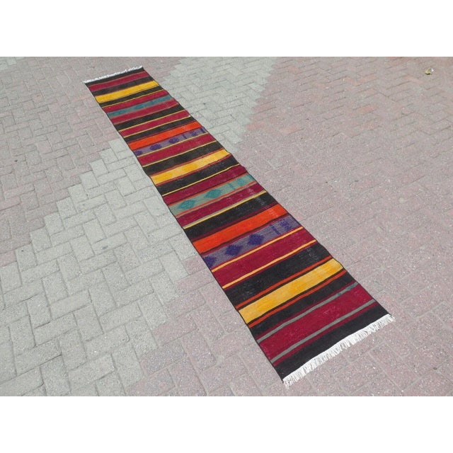 This beautiful, traditional vintage, hand knotted Turkish runner is approximately 60 years old. It is handmade of very...
