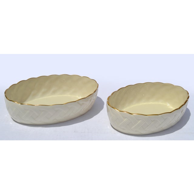 The Pair of Lenox Lattice server is an ivory fine ceramic china serving piece Set with a 24K gold-accented lattice design,...