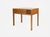 Danish Modern teak nesting folding table set designed by Illum Wikkelso for Silkeborg. The side table features a set of...