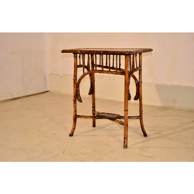 19th century tortoise bamboo side table with chinoiserie decoration from France. This table is fabulous! It has a bamboo...